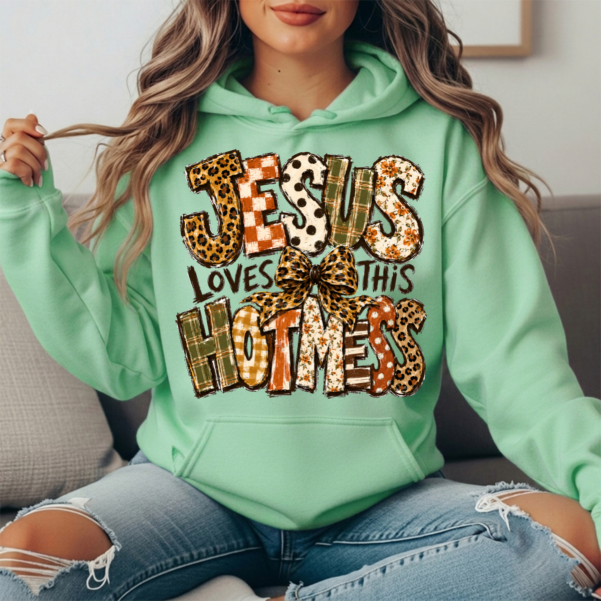Jesus Loves This Hot Mess Leopard Bow Graphic Hoodie