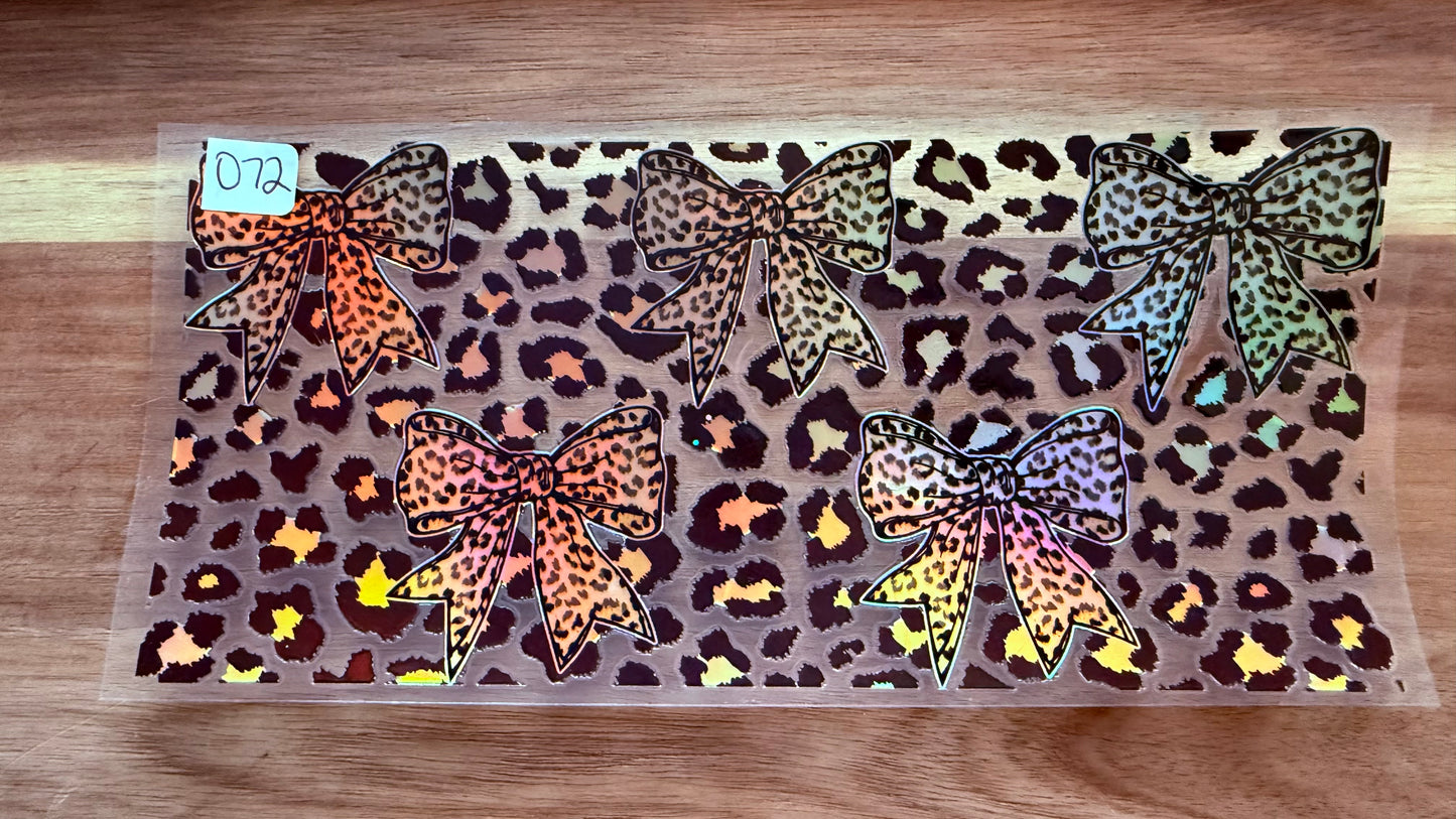 #72 Leopard print bows- holographic