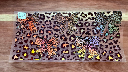 #72 Leopard print bows- holographic