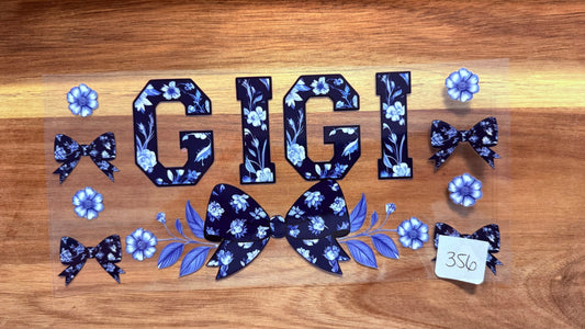 #356 GiGi with blue flowers and bow