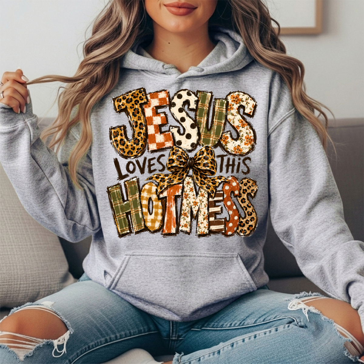 Jesus Loves This Hot Mess Leopard Bow Graphic Hoodie