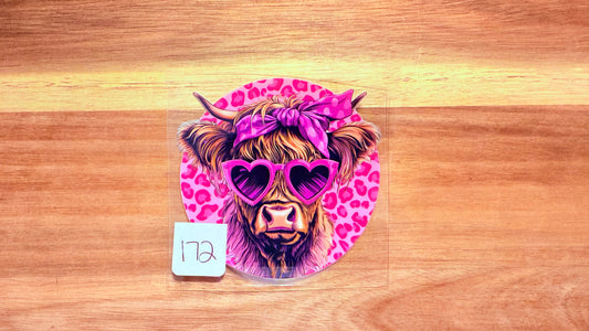 #172 Brown highland with pink heart glasses
