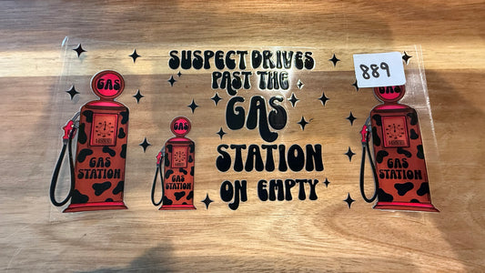 #889 Drives past gas station